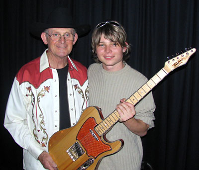 ALLAN TOMKINS  and JAKE NICKOLAI